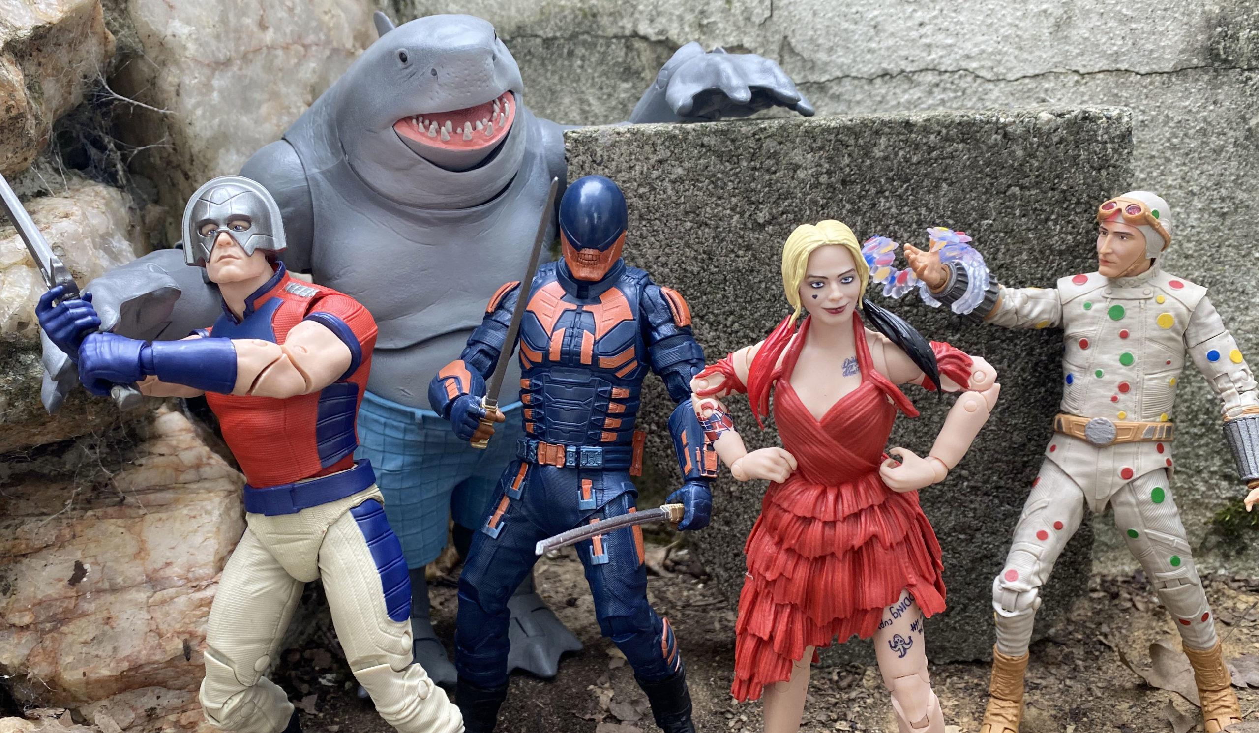 'The Suicide Squad' action figure line from McFarlane Toys includes Peacemaker, "Build-a-Fig" King Shark, Harley Quinn, Bloodsport and Polka-Dot Man. (Photograph by Joseph Szadkowski)