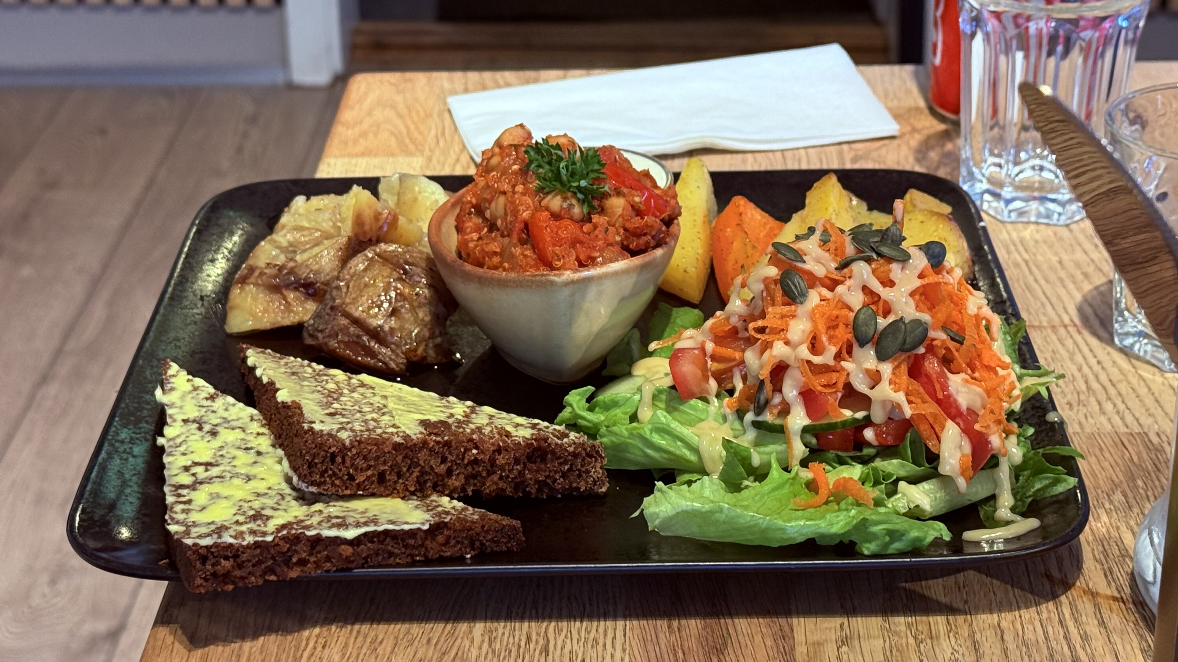 Traditional tasting platter with rye bread and smoked fish