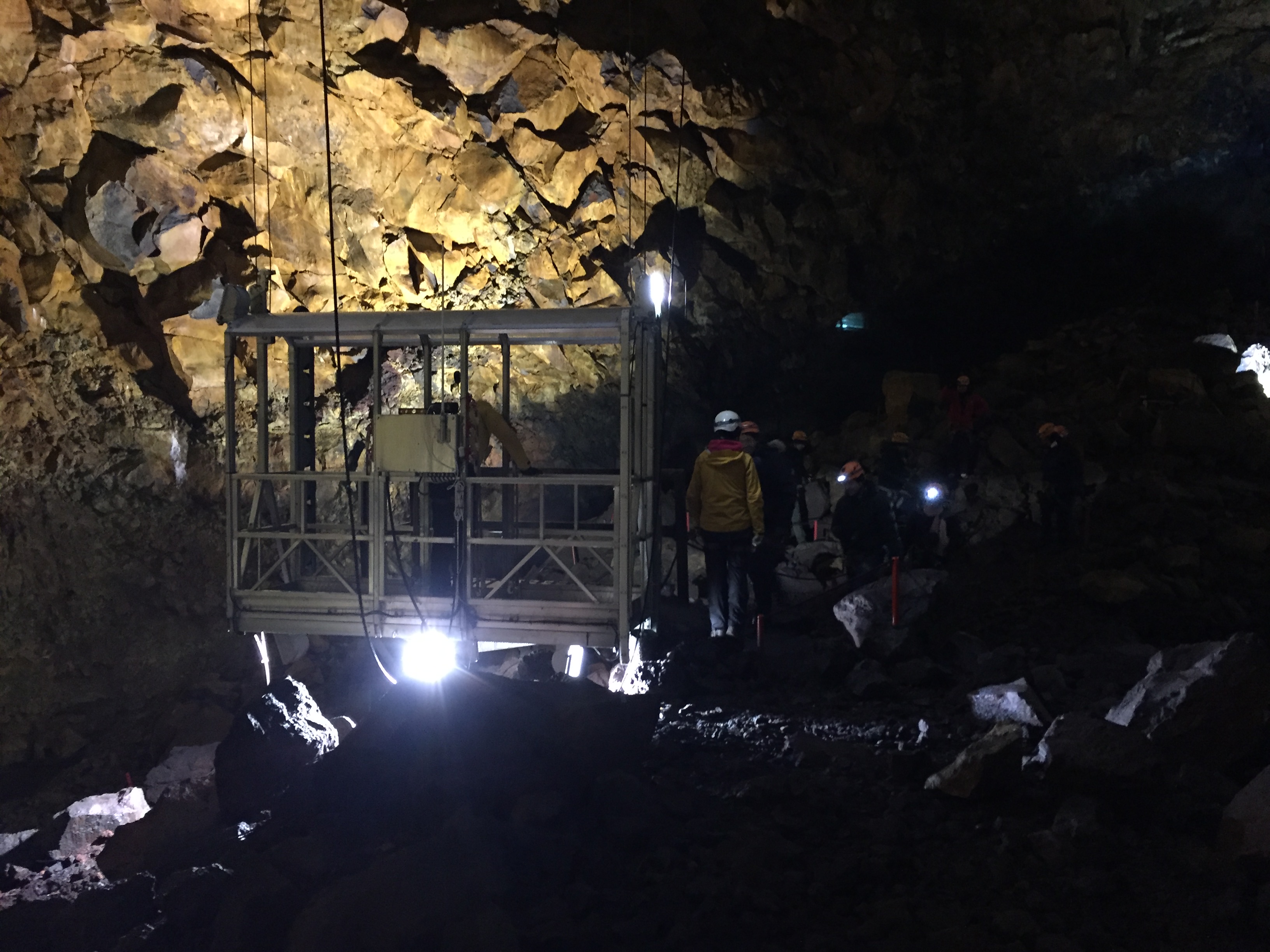 Visitors on the open-cable lift 120 m underground