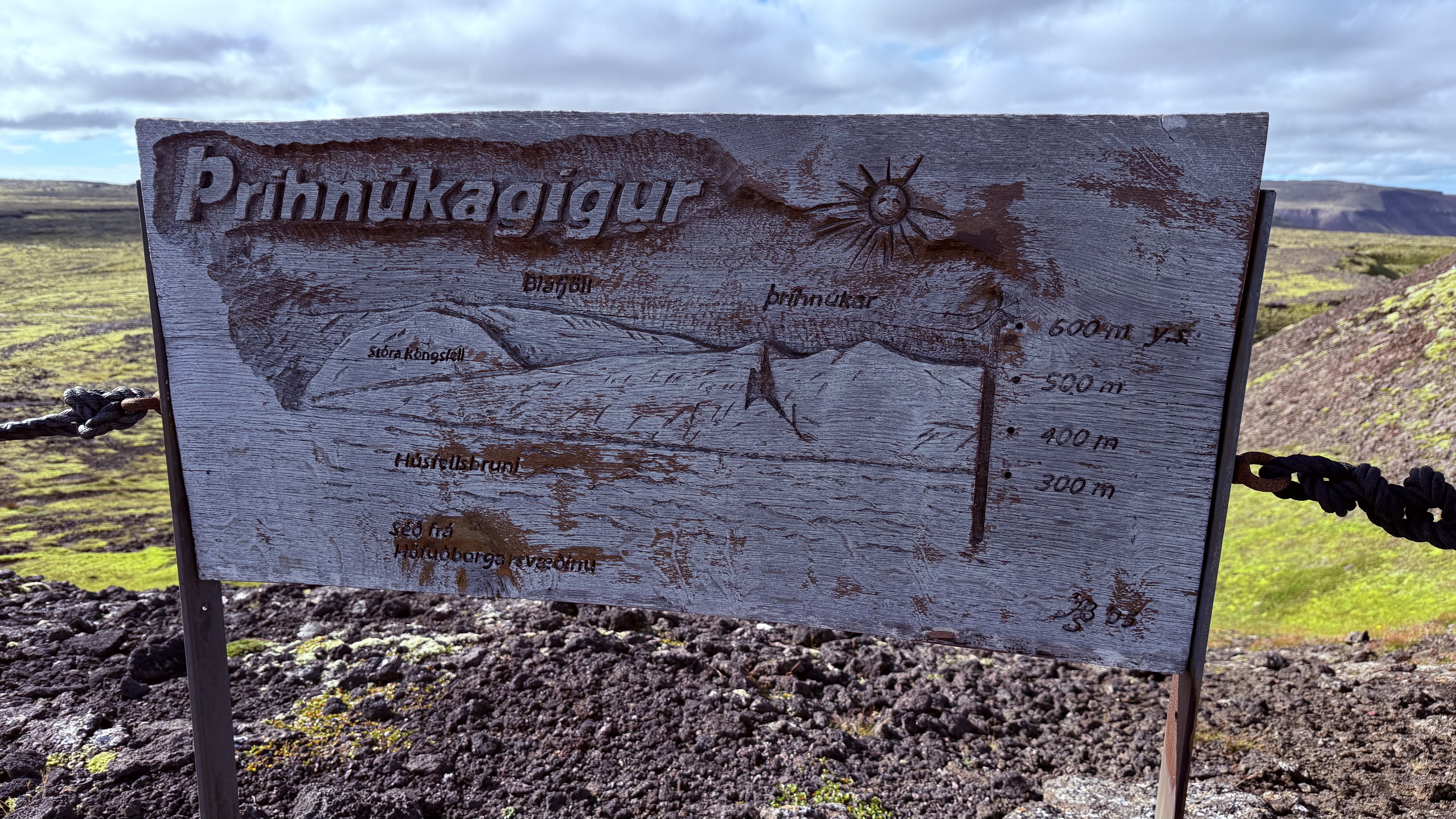 &THORN;r&iacute;hnj&uacute;kag&iacute;gur information sign on the lava field